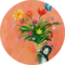 Illustration of a cat holding up a colourful bouquet of flowers on a red background | © SONNENTOR